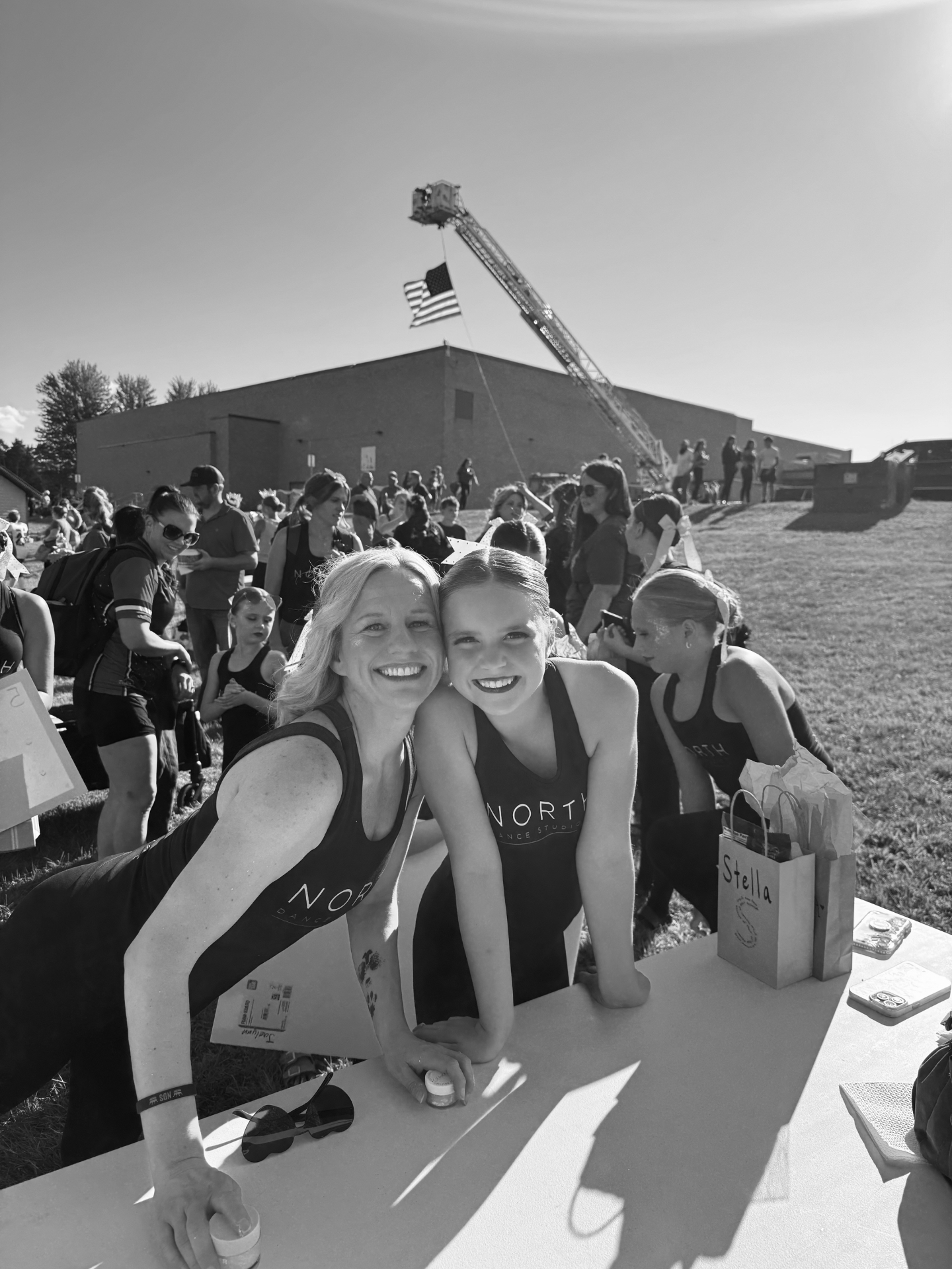 Instructor and dancer at the North Dance Studio table