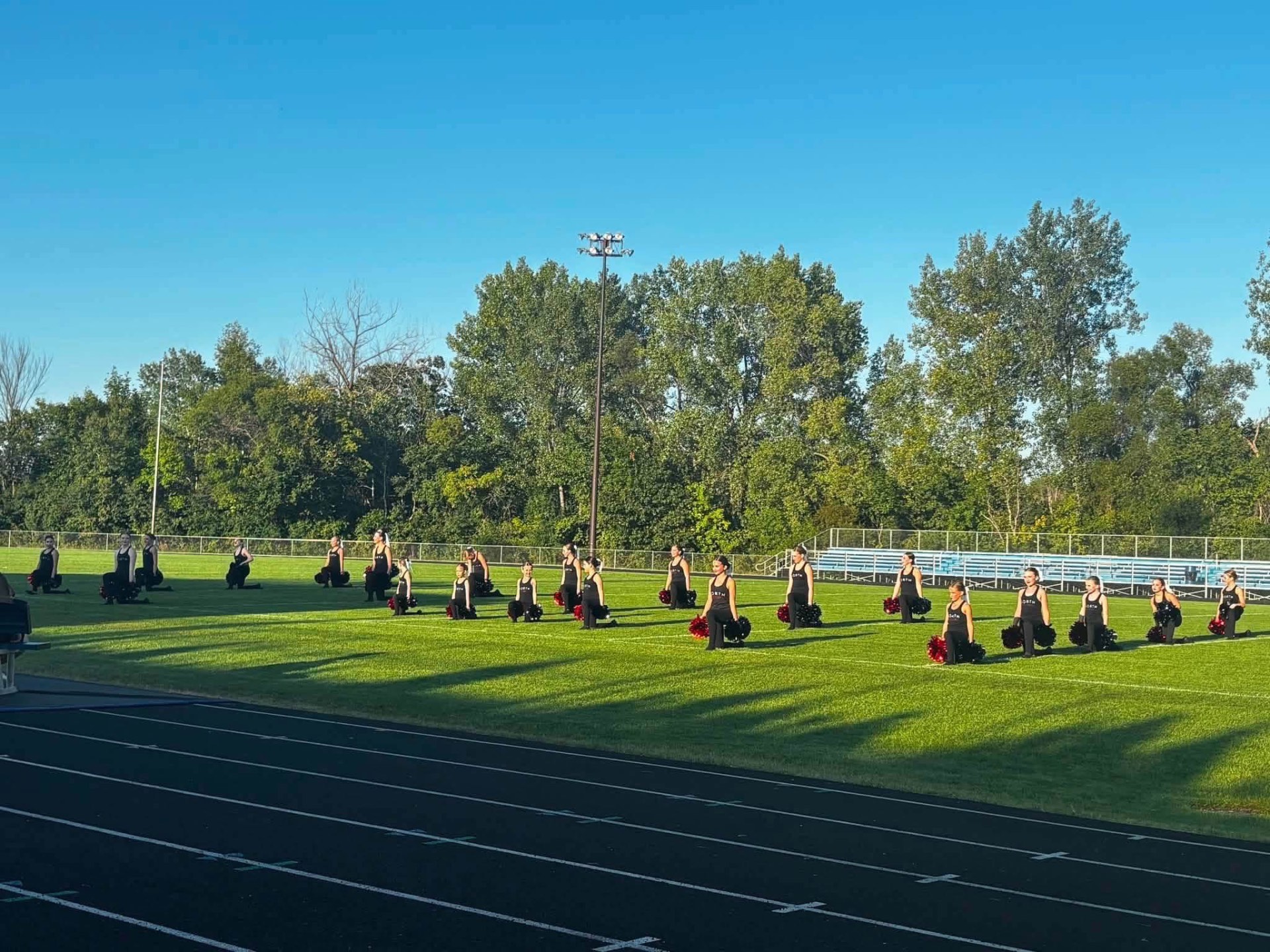 Dancers performing on the football field