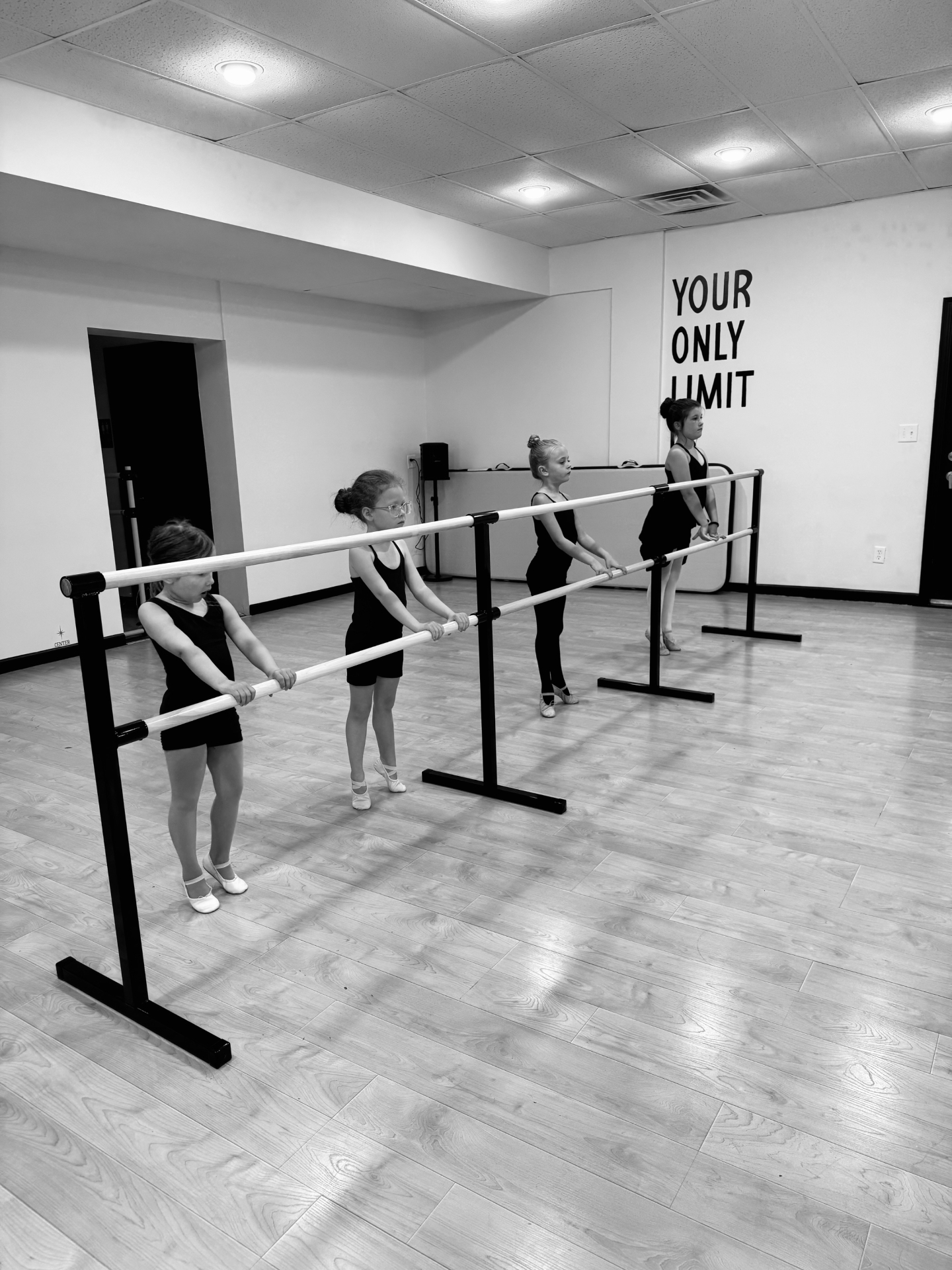 Young dancers practicing at the barre at North Dance Studio