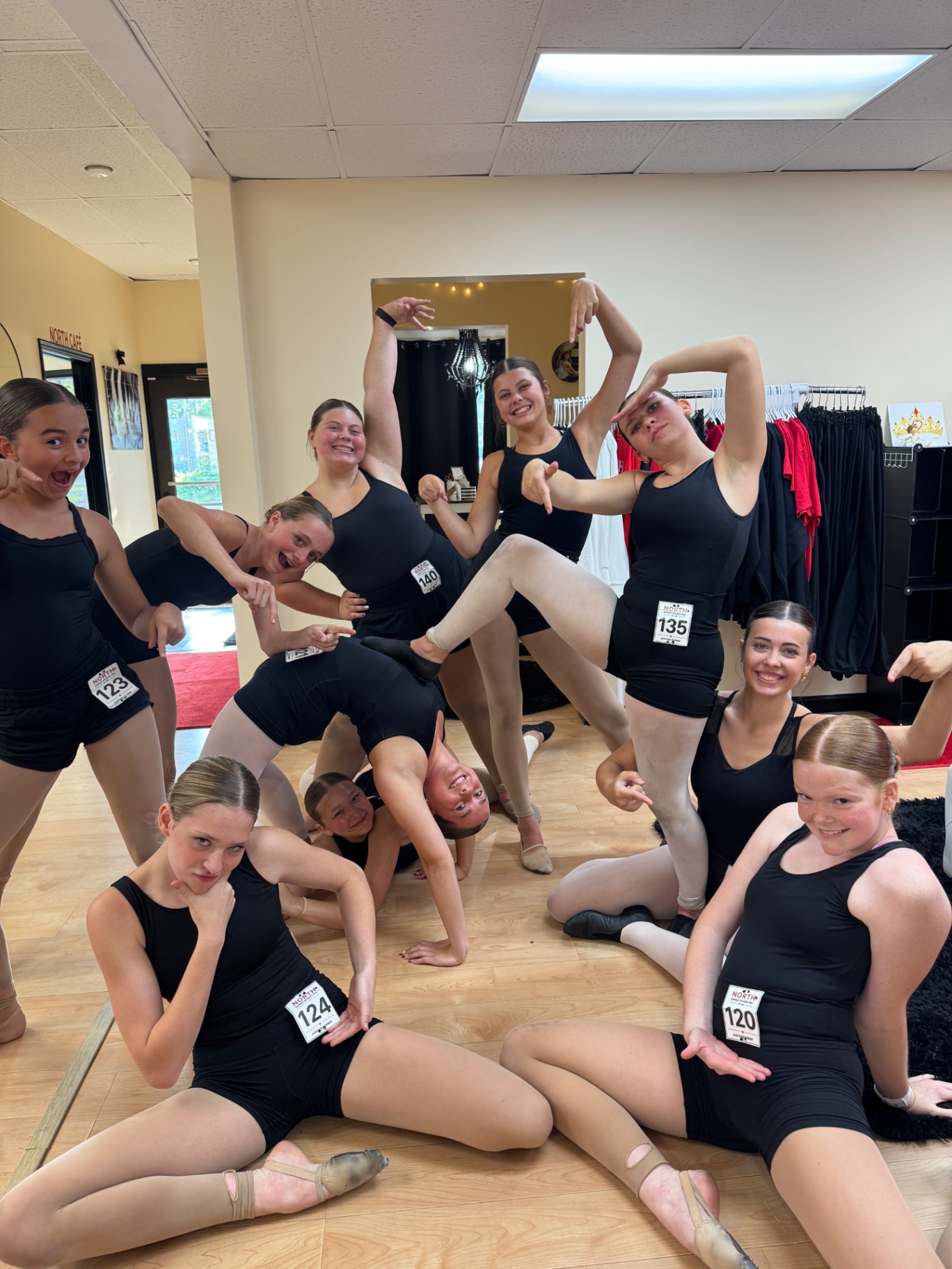 North Dance Studio dancers posing together in the studio during auditions