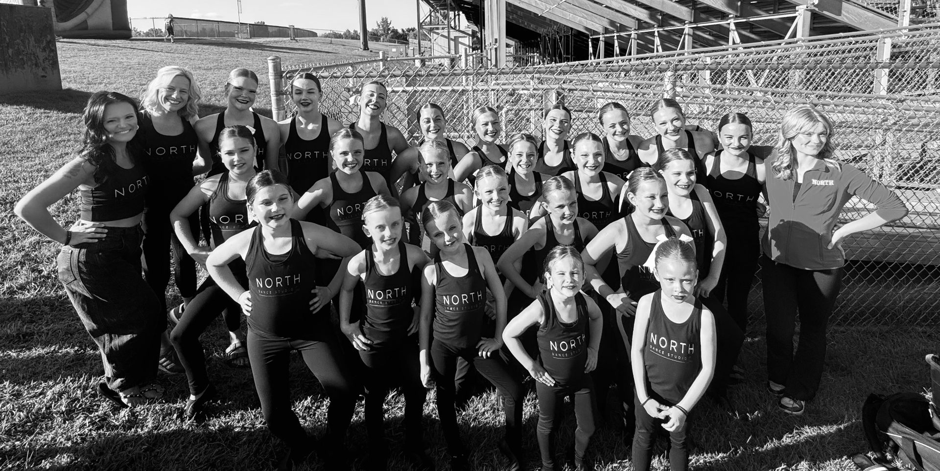 The full North Dance Studio team at the football field